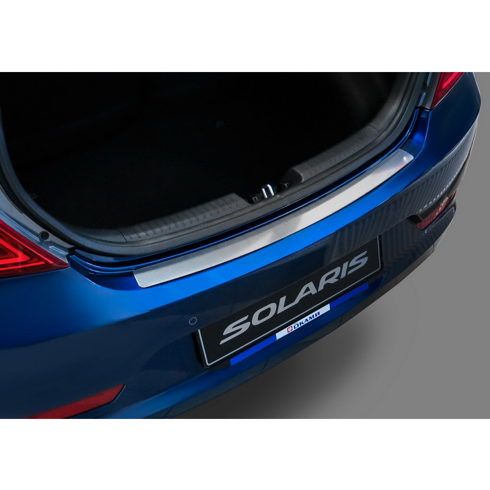 Накладка на задний бампер Hyundai Solaris нержавеющая сталь серебристый 1 шт. Rival NB.H.2301.1